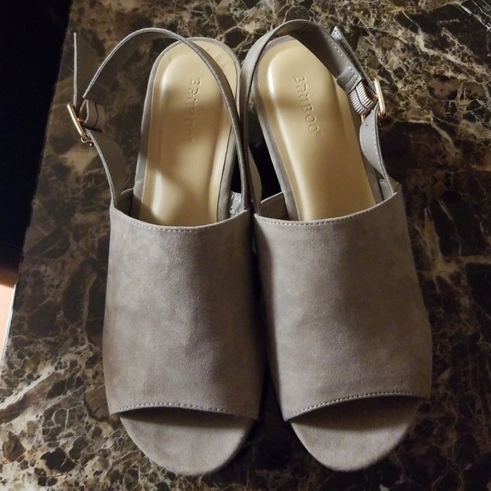 Bamboo tan wedges worn once. Cute and stylish